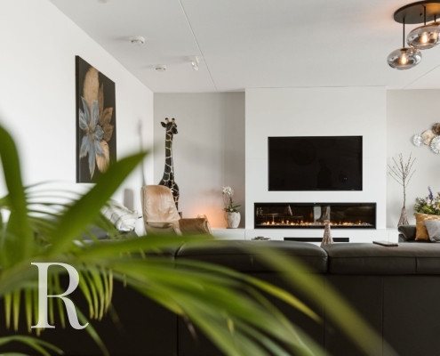 Witte cinewall met sfeerhaard